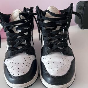 Jordan 1’s black and white mid women shoes.